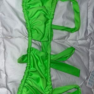 Frankie’s bikini top and bottom. Size medium. Brand new with tags.